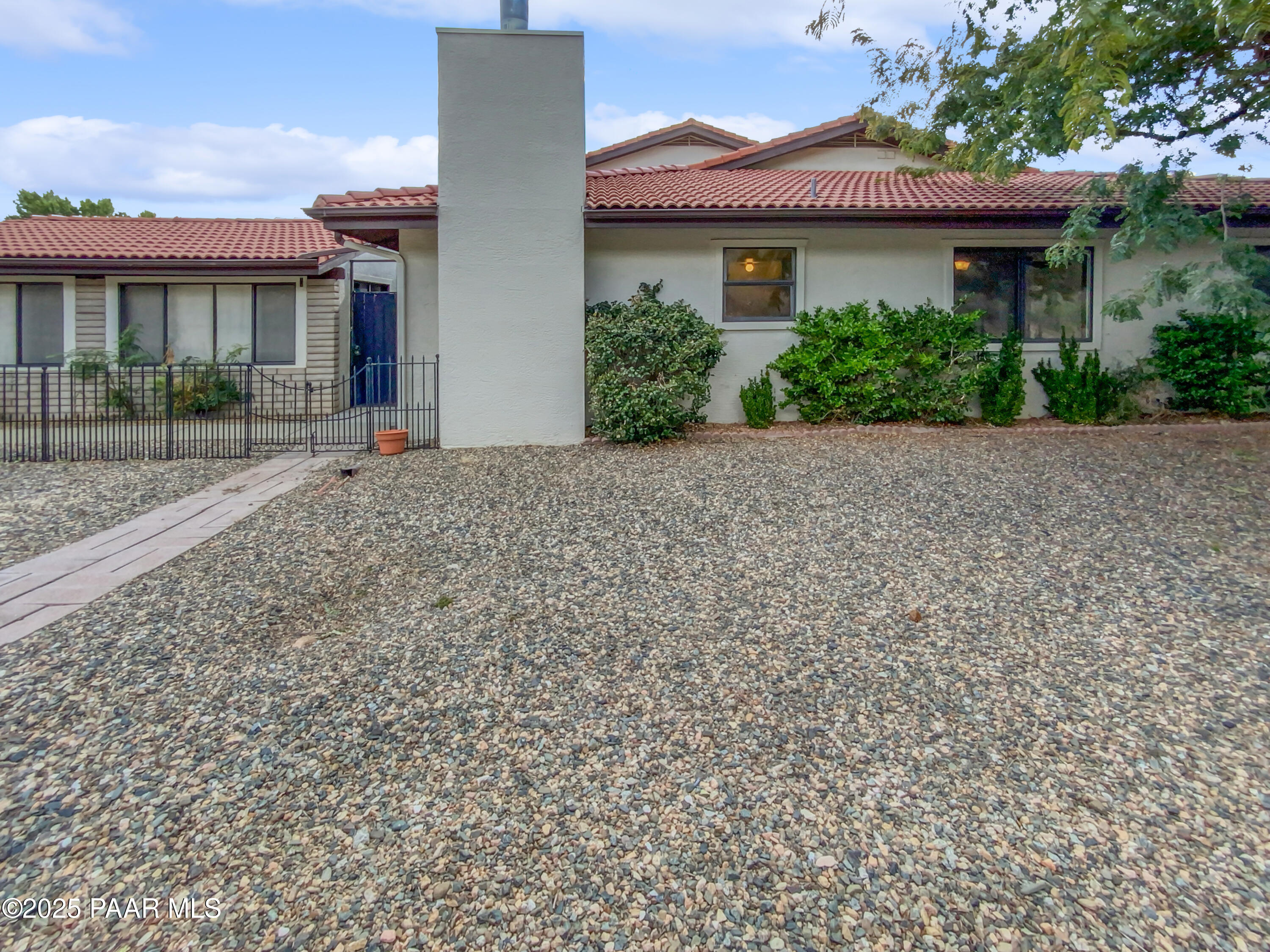 410 Apache Plume Trail Prescott, AZ 86301 - Photo 7 of 22 front view of a house with a street