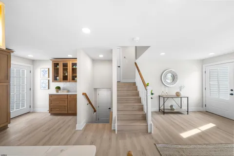 a kitchen with a sink stove and cabinets
