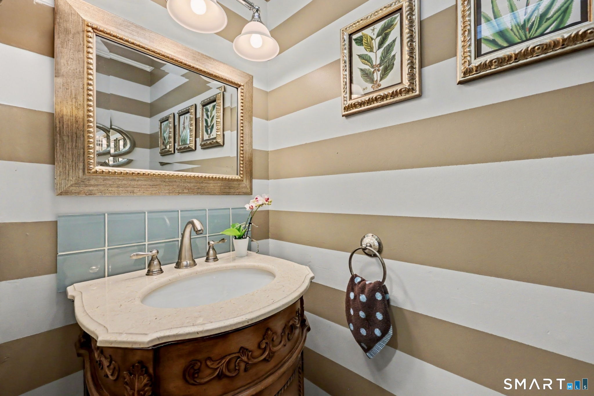 1100 Stillwater Road Stamford, CT 06902 - Photo 17 of 40 Pretty Powder Room completes the main floor