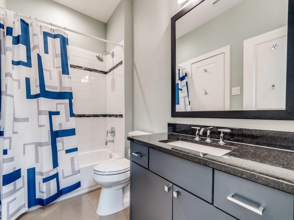 7912 Hanover Street Dallas, TX 75225 - Photo 20 of 25 Full bath featuring vanity and shower / bath combination with curtain