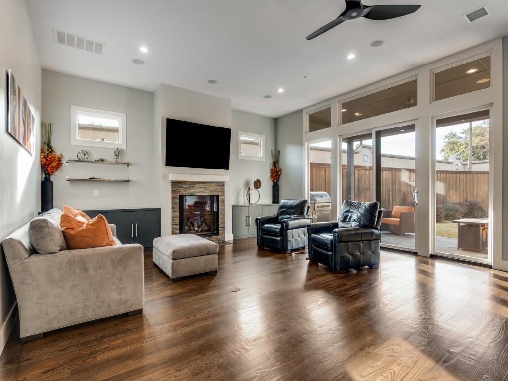 7912 Hanover Street Dallas, TX 75225 - Photo 6 of 25 Living area with dark wood-style floors, a ceiling fan, a fireplace, and recessed lighting