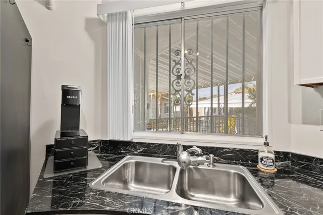 a dining room with table and chairs