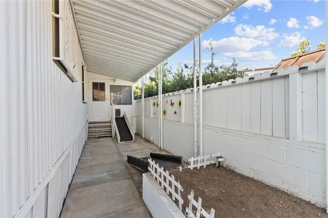 a front view of a house with a outdoor space