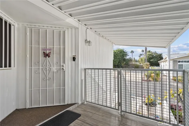 a view of multiple houses with a street