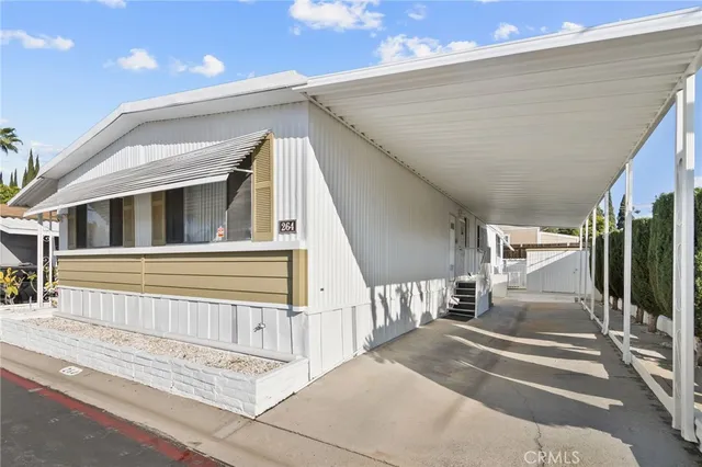 a view of a swimming pool with outdoor seating