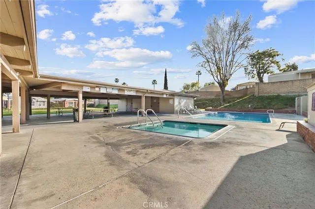 a view of a park with large trees