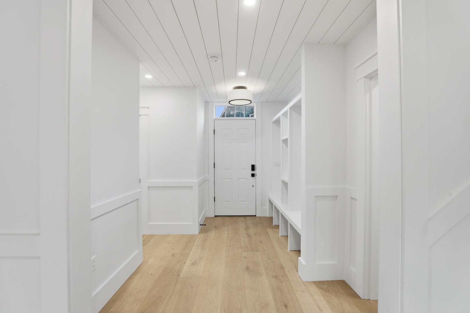 6 Mariner Way Nantucket, MA 02554 - Photo 12 of 31 a view of a hallway with wooden floor