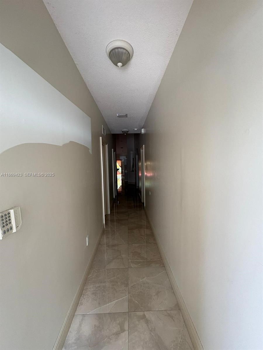 3279 Northeast 11th Drive Homestead, FL 33033 - Photo 11 of 15 a view of hallway