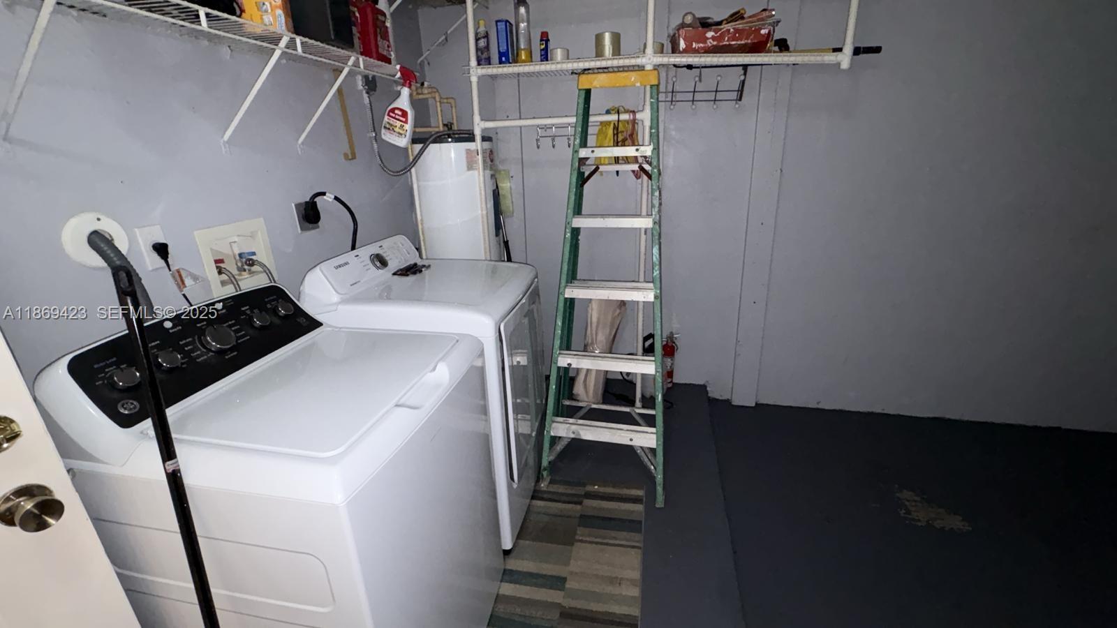 3279 Northeast 11th Drive Homestead, FL 33033 - Photo 14 of 15 a utility room with dryer and washer