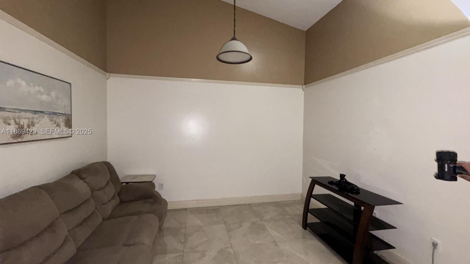 3279 Northeast 11th Drive Homestead, FL 33033 - Photo 3 of 15 a living room with furniture