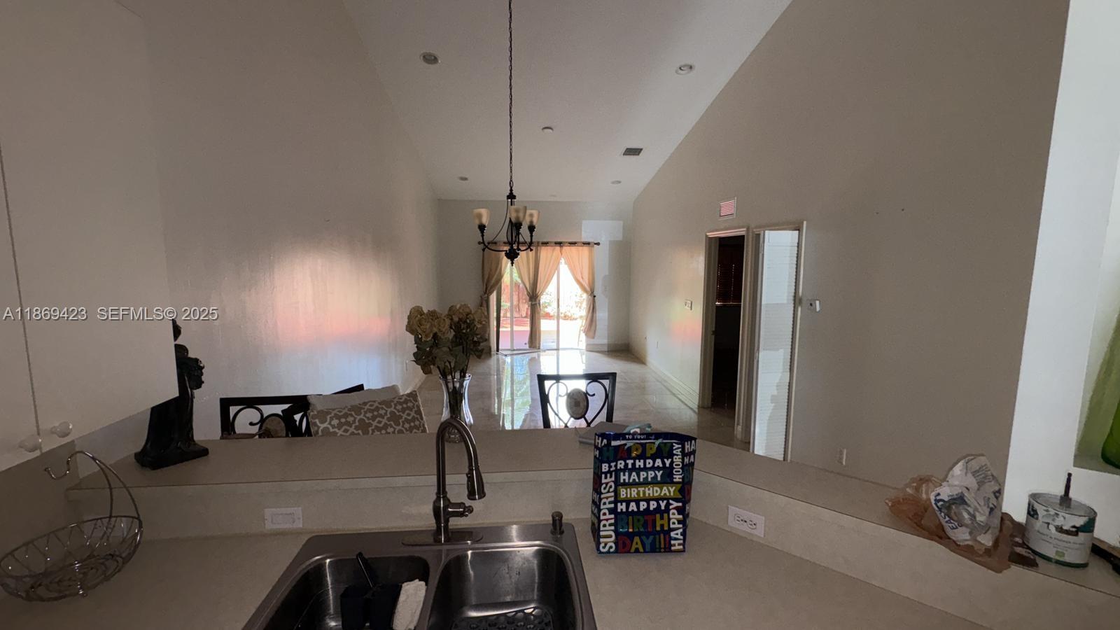 3279 Northeast 11th Drive Homestead, FL 33033 - Photo 5 of 15 a view of a room with gym equipment