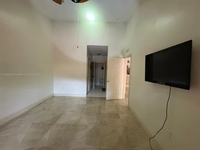 a view of a livingroom with furniture