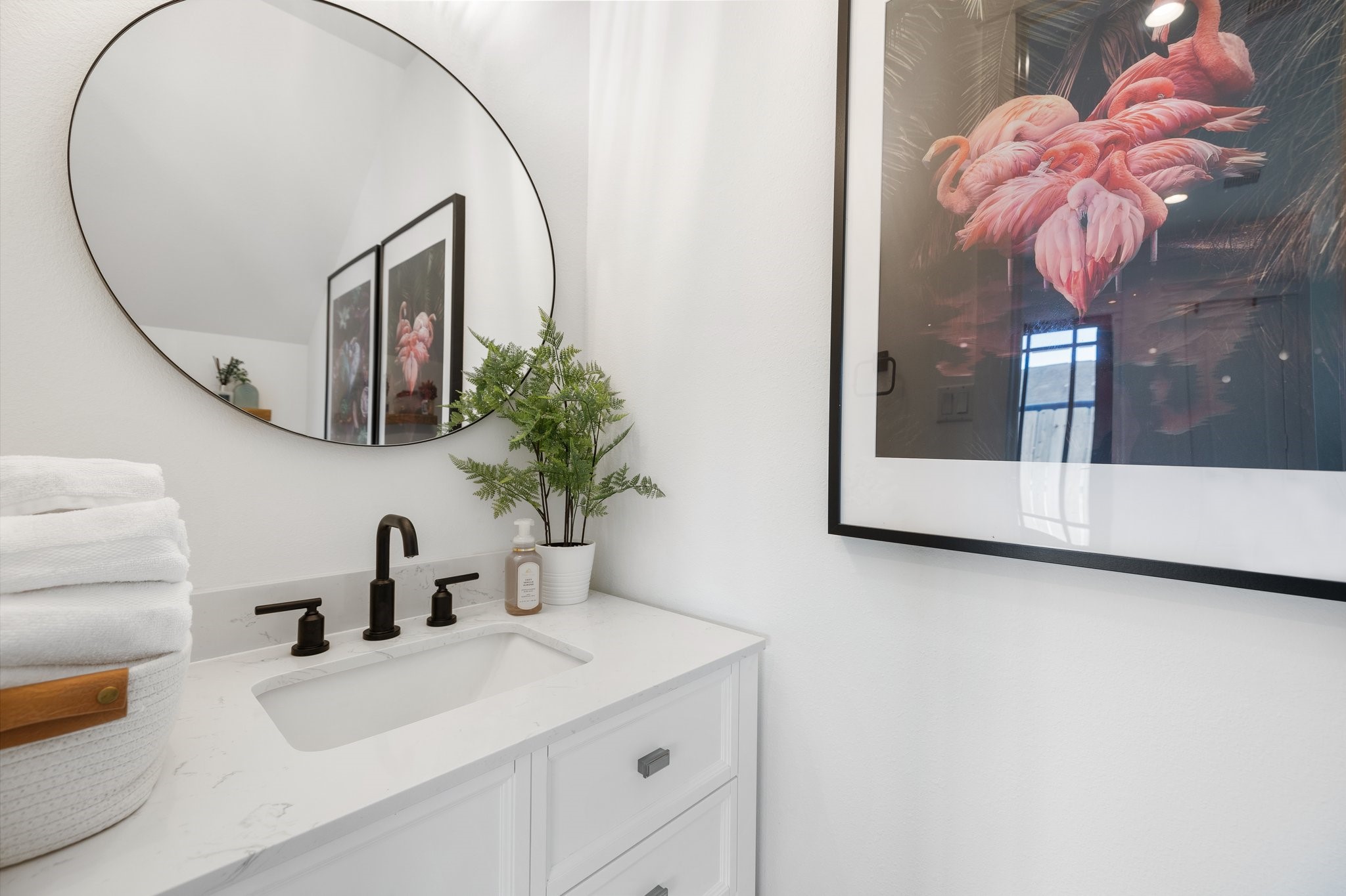 817 West 19th Street Houston, TX 77008 - Photo 9 of 24 a bathroom with a sink a mirror and vanity