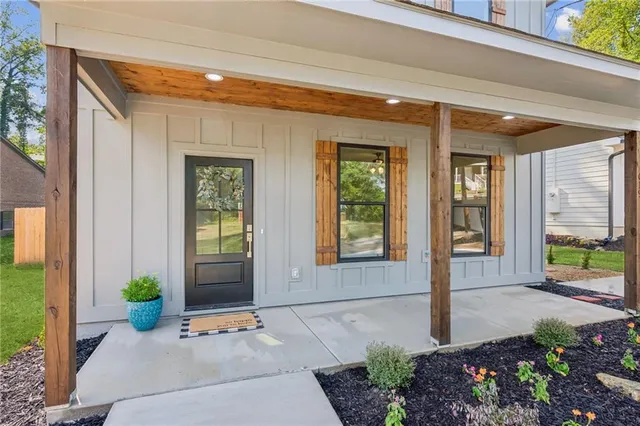 a front view of a house with a porch
