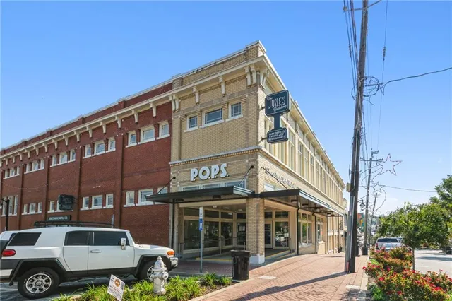 a view of a food mall with a large windows