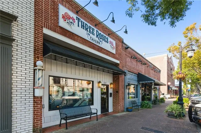 a view of a chairs and table in the patio