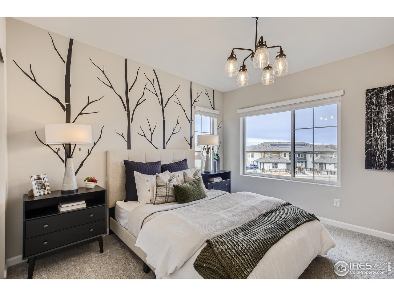 1002 Collamer Drive, Unit 8 Fort Collins, CO 80524 - Photo 27 of 39 a bedroom with a bed and a window