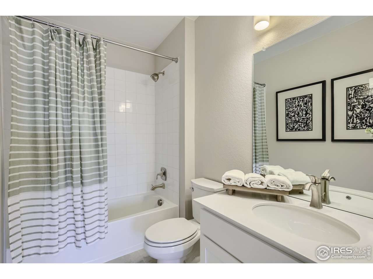 1002 Collamer Drive, Unit 8 Fort Collins, CO 80524 - Photo 29 of 39 a bathroom with a sink toilet and shower