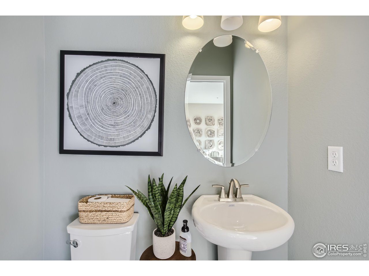 1002 Collamer Drive, Unit 8 Fort Collins, CO 80524 - Photo 31 of 39 a bathroom with a toilet and a sink