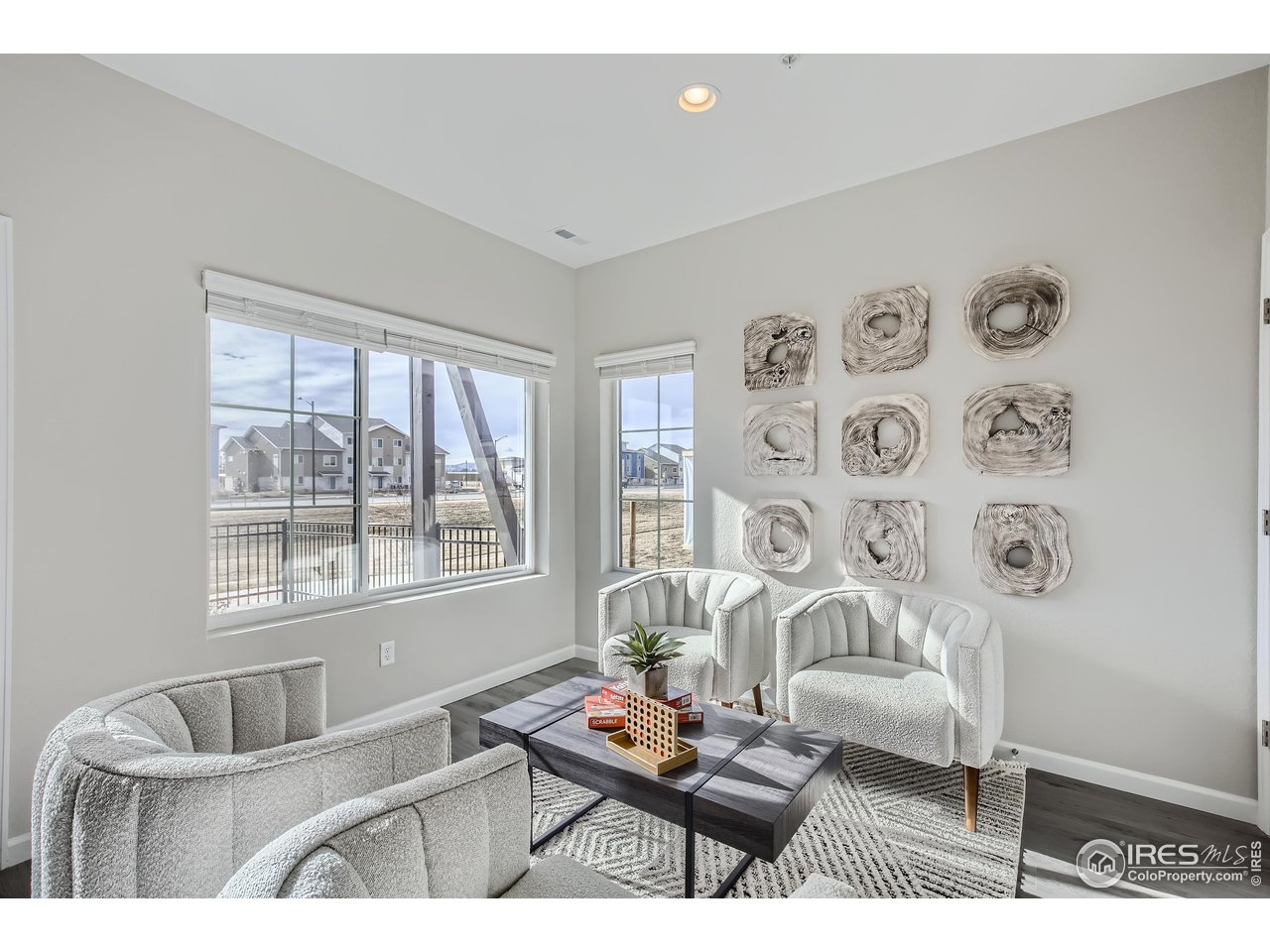 1002 Collamer Drive, Unit 8 Fort Collins, CO 80524 - Photo 33 of 39 a living room with furniture and a window