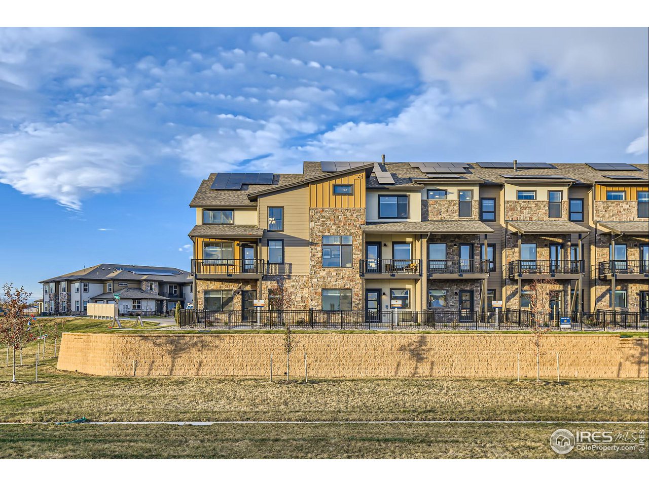 1002 Collamer Drive, Unit 8 Fort Collins, CO 80524 - Photo 35 of 39 a view of swimming pool with outdoor seating