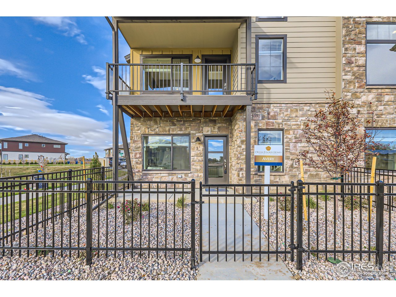 1002 Collamer Drive, Unit 8 Fort Collins, CO 80524 - Photo 36 of 39 a front view of a house with a balcony