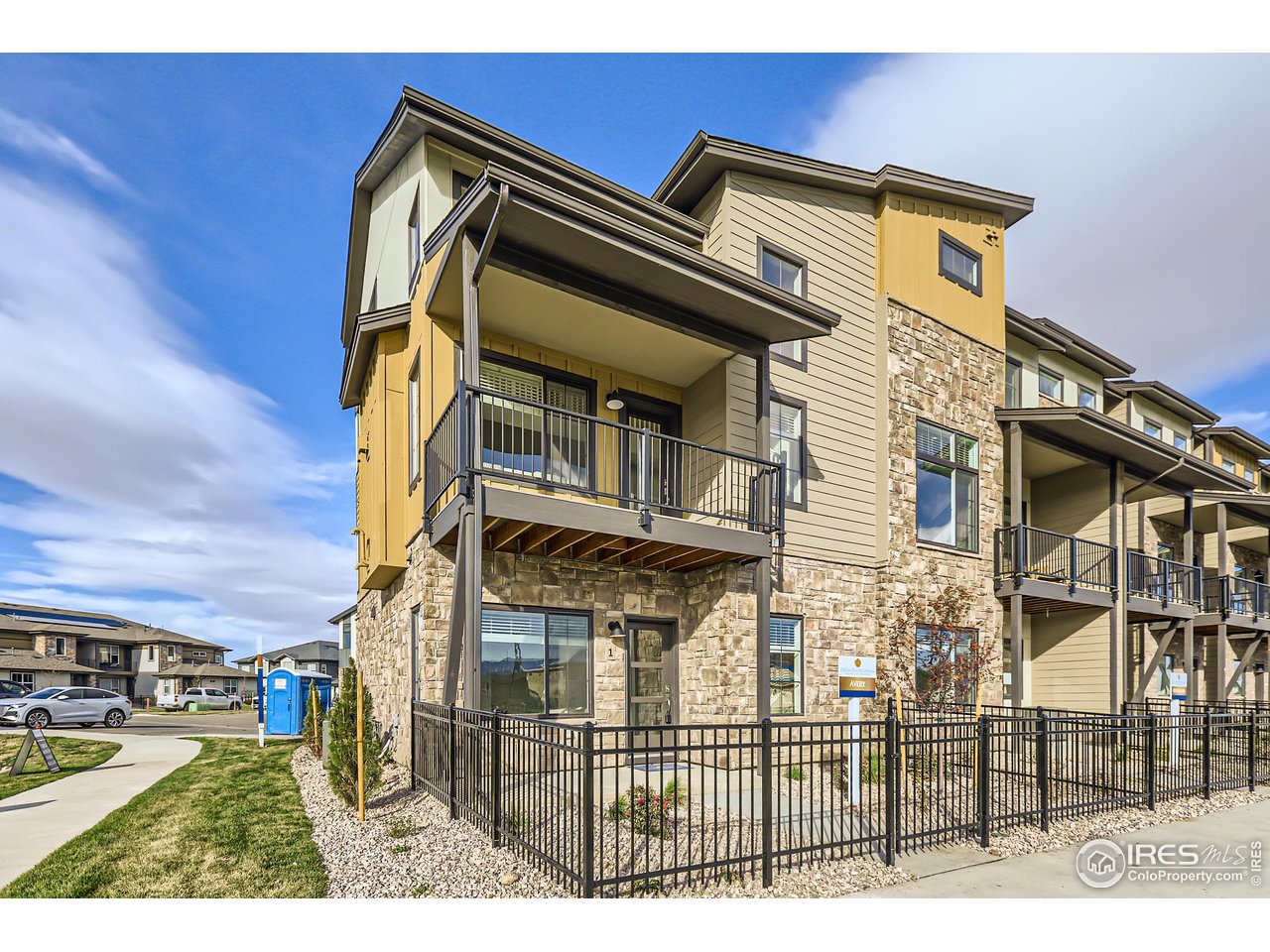 1002 Collamer Drive, Unit 8 Fort Collins, CO 80524 - Photo 37 of 39 a view of a house with a balcony