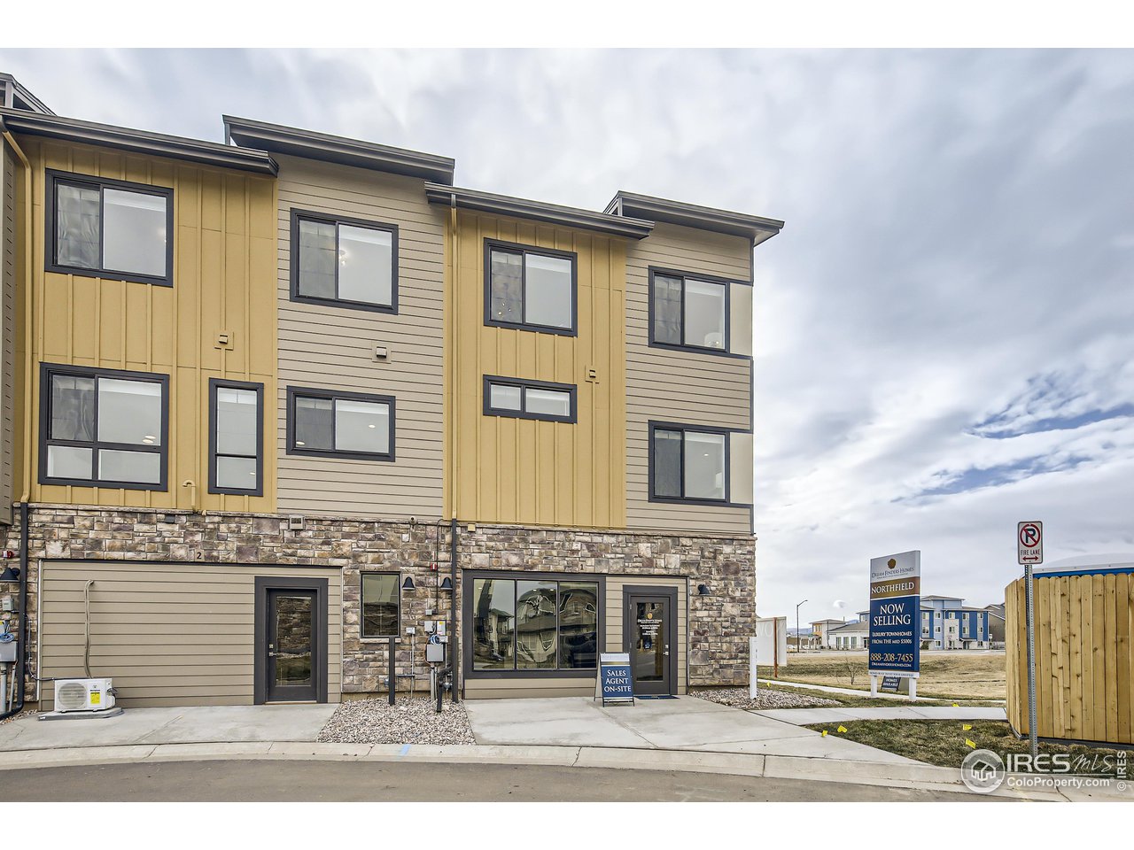 1002 Collamer Drive, Unit 8 Fort Collins, CO 80524 - Photo 39 of 39 a front view of a house with a yard