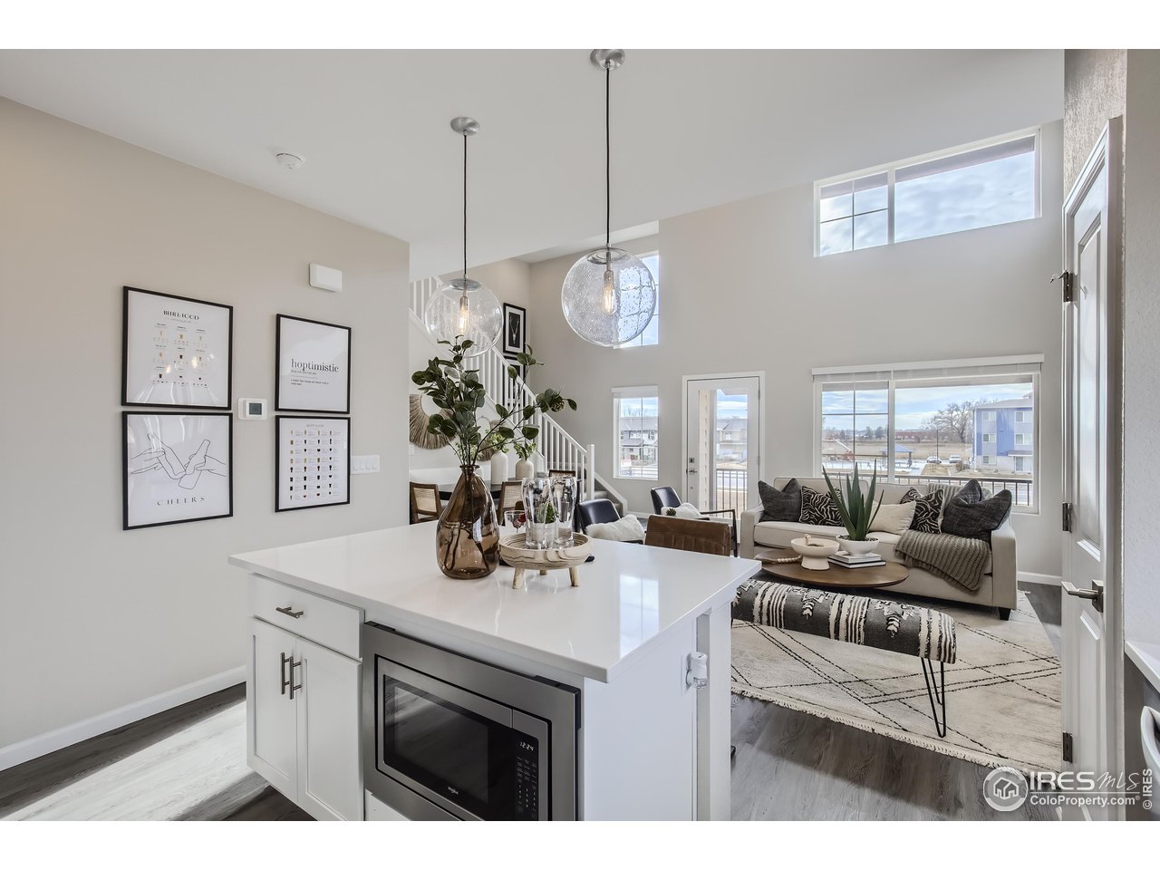 1002 Collamer Drive, Unit 8 Fort Collins, CO 80524 - Photo 16 of 39 a view of living room with granite countertop furniture and fireplace