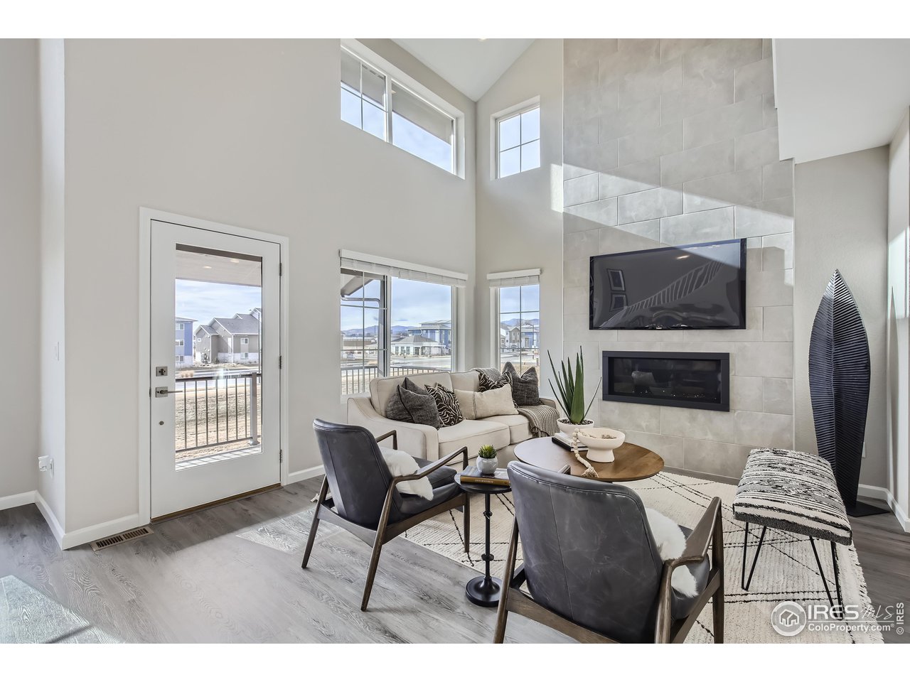 1002 Collamer Drive, Unit 8 Fort Collins, CO 80524 - Photo 17 of 39 a outdoor living space with furniture and a fireplace