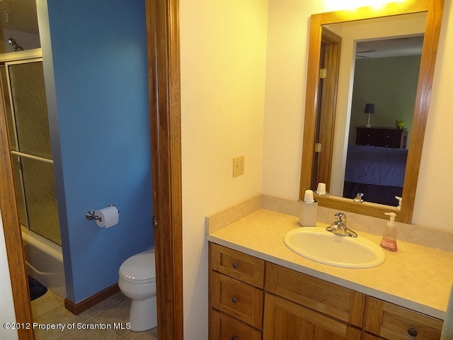 15 North Legend Road Shavertown, PA 18708 - Photo 16 of 23 a bathroom with a sink a toilet and shower