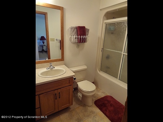 15 North Legend Road Shavertown, PA 18708 - Photo 17 of 23 a bathroom with a sink toilet and shower