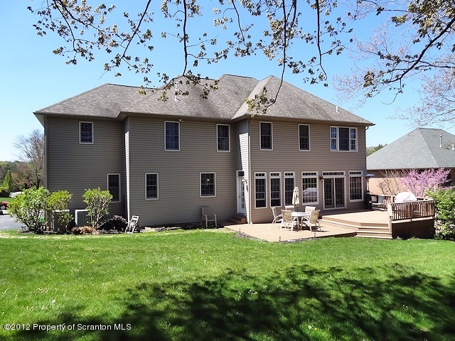 15 North Legend Road Shavertown, PA 18708 - Photo 23 of 23 a front view of a house with a garden and sitting area
