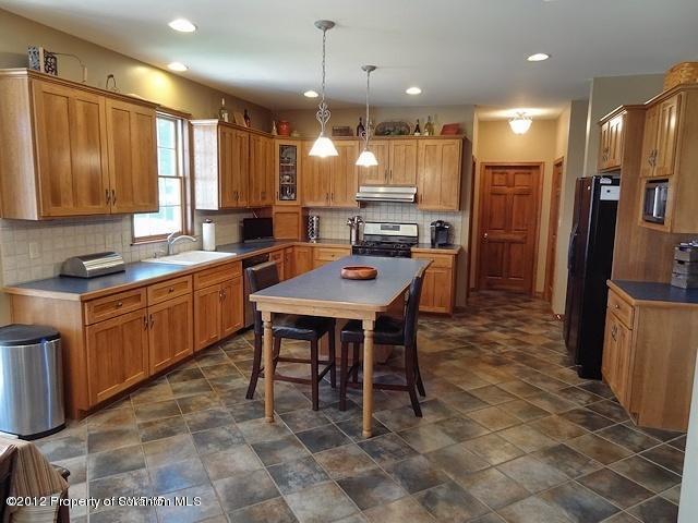 15 North Legend Road Shavertown, PA 18708 - Photo 7 of 23 a kitchen with a table and chairs in it
