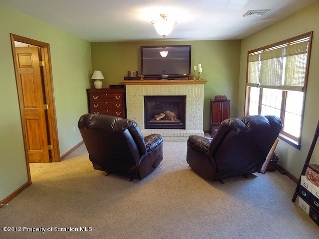 15 North Legend Road Shavertown, PA 18708 - Photo 9 of 23 a living room with furniture and a fireplace
