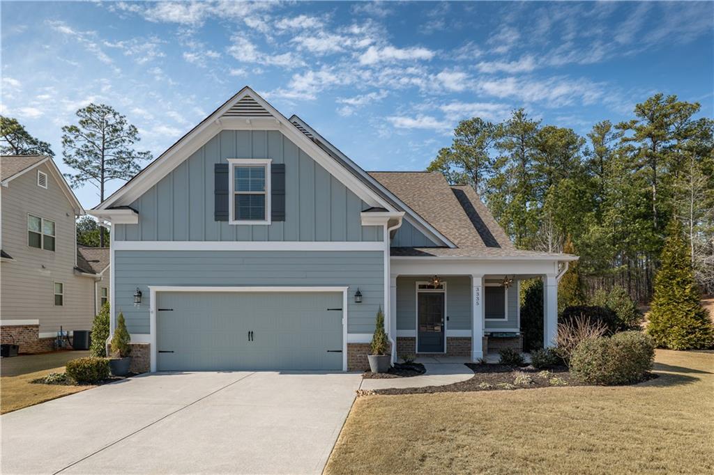 3335 Harmony Hill Road Kennesaw, GA 30144 - Photo 1 of 1 a front view of a house with a yard