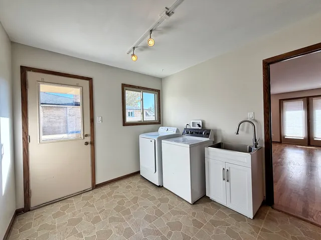 a view of a room with dryer and washer
