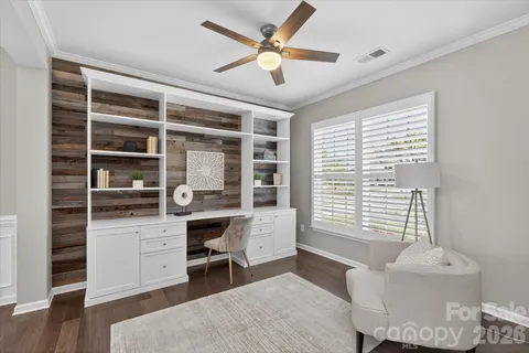 a room with furniture and a window
