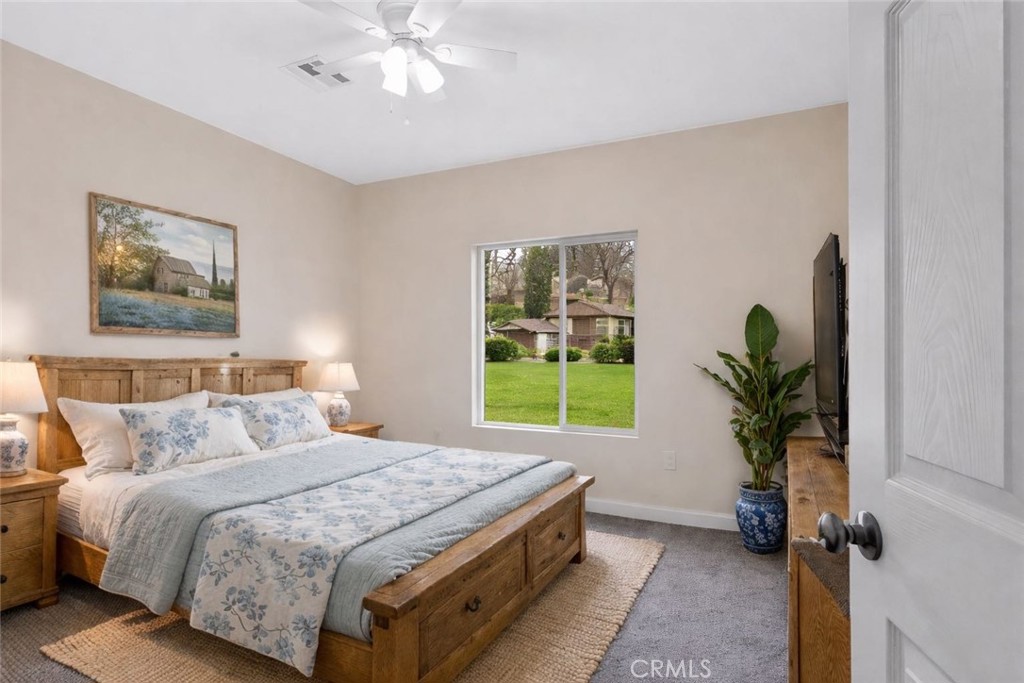 28551 Delaware Drive Tehachapi, CA 93561 - Photo 19 of 34 a bedroom with a bed and a window