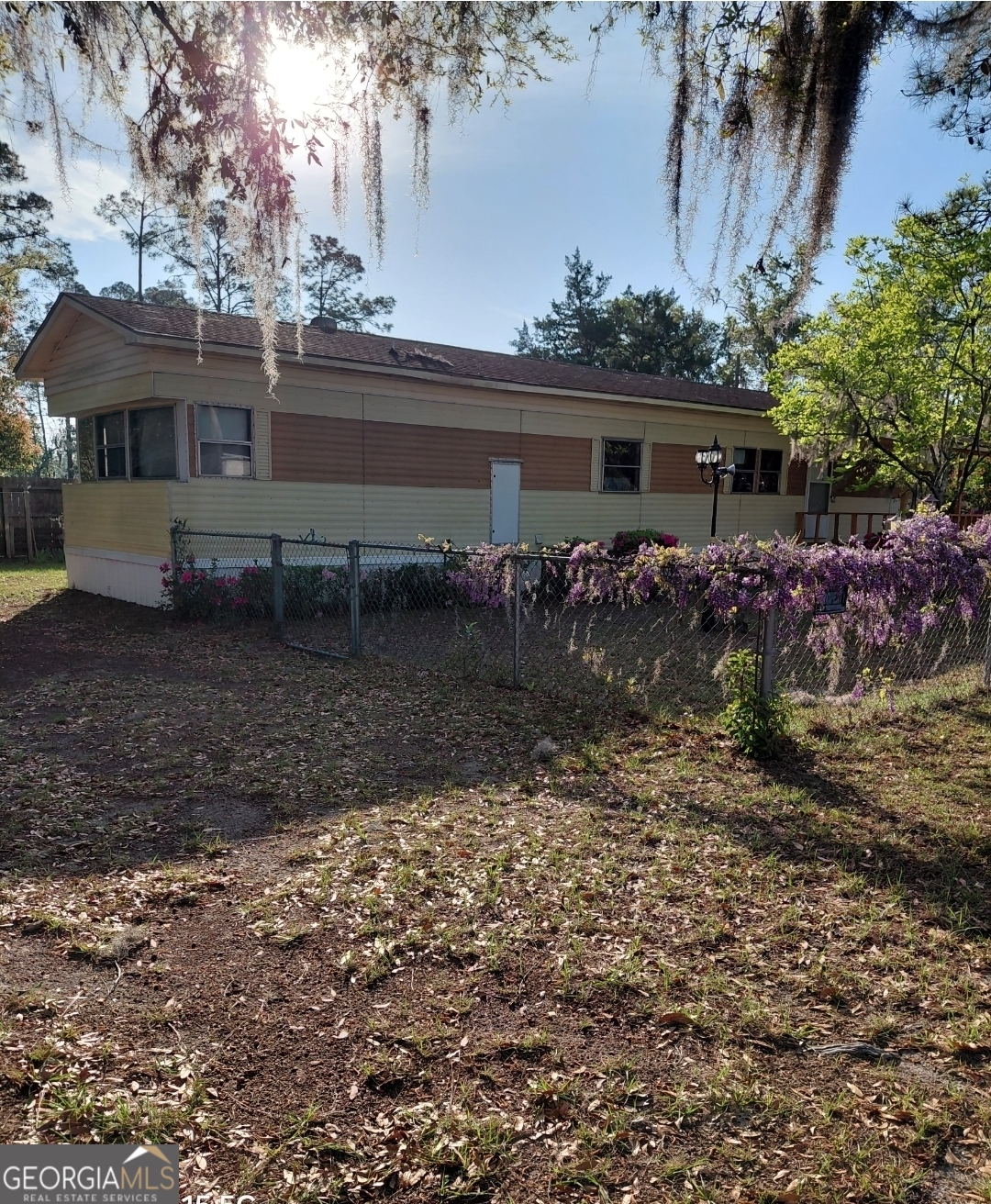20 Gibson Street Folkston, GA 31537 - Photo 2 of 10 a view of a house with a yard