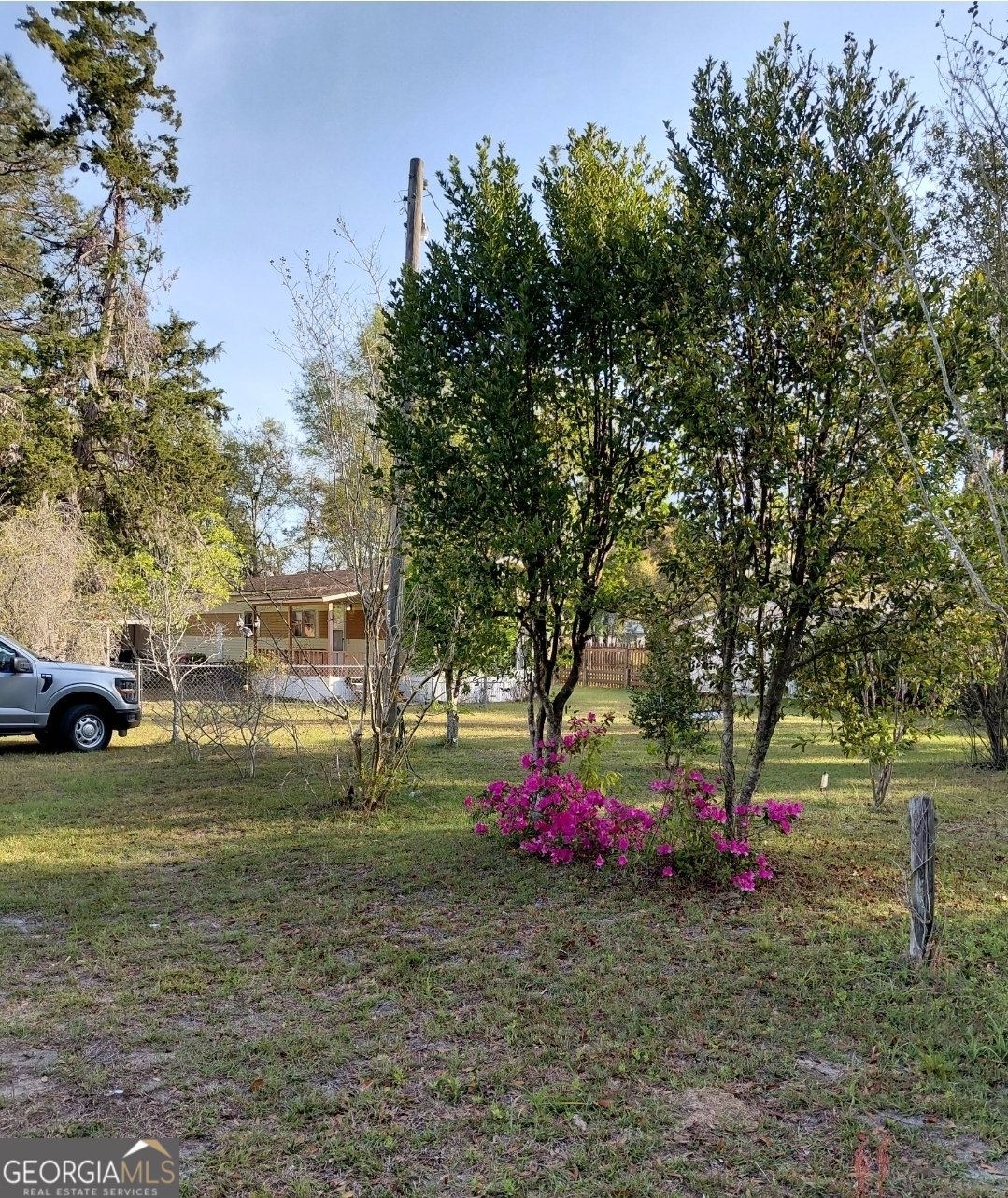 20 Gibson Street Folkston, GA 31537 - Photo 4 of 10 a view of a park with large trees