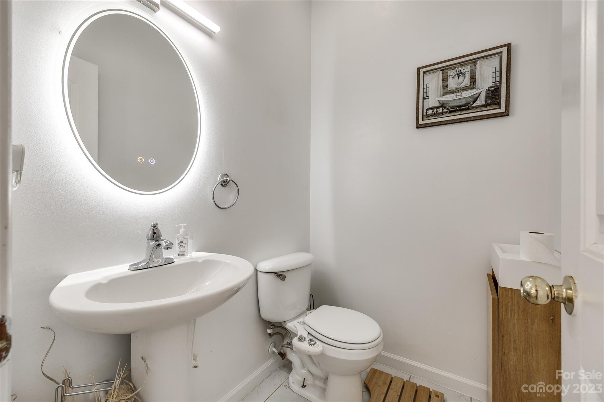 7111 Simbrah Way Charlotte, NC 28273 - Photo 20 of 23 a bathroom with a toilet and a sink