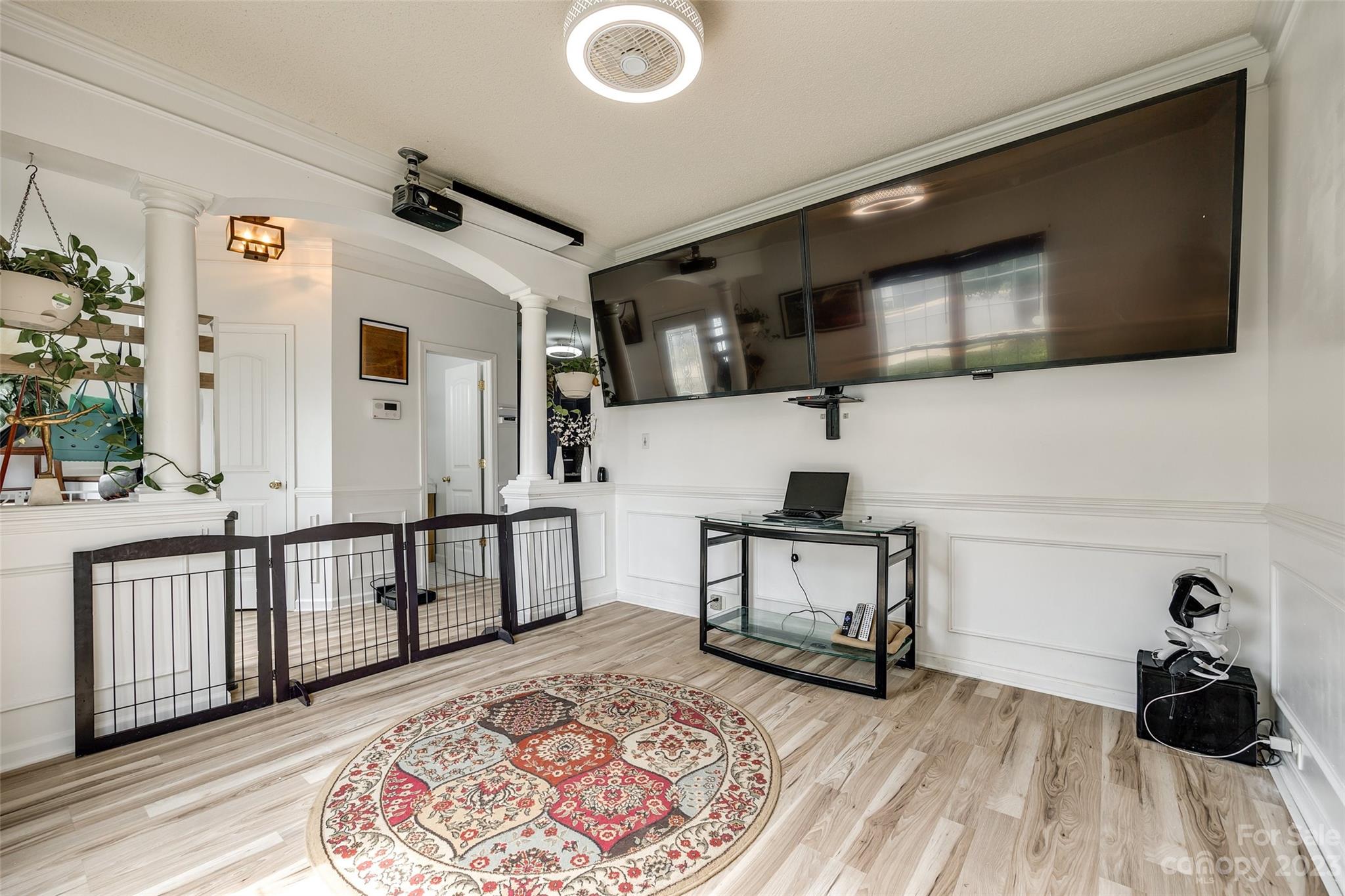 7111 Simbrah Way Charlotte, NC 28273 - Photo 5 of 23 a living room with furniture and a flat screen tv