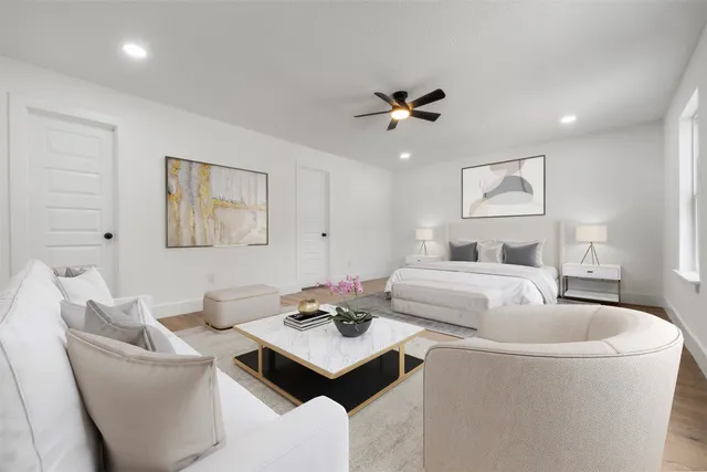 a living room with furniture and a table