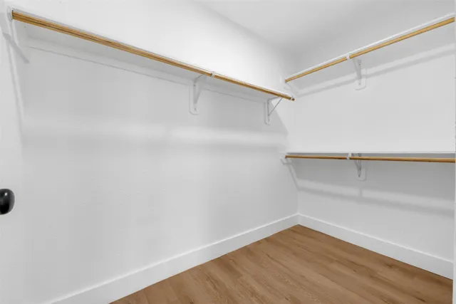 a view of an empty walk in closet