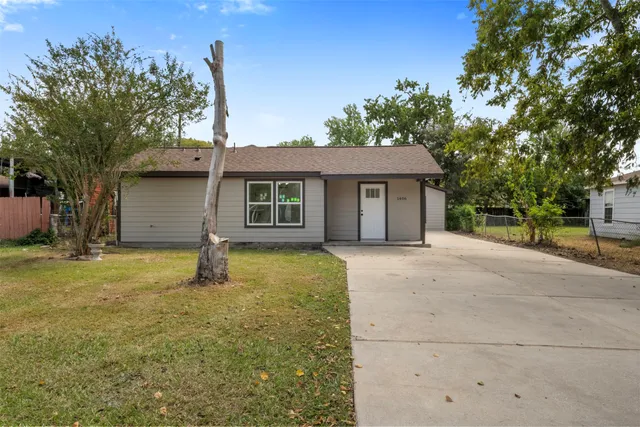 a house with trees in front of it