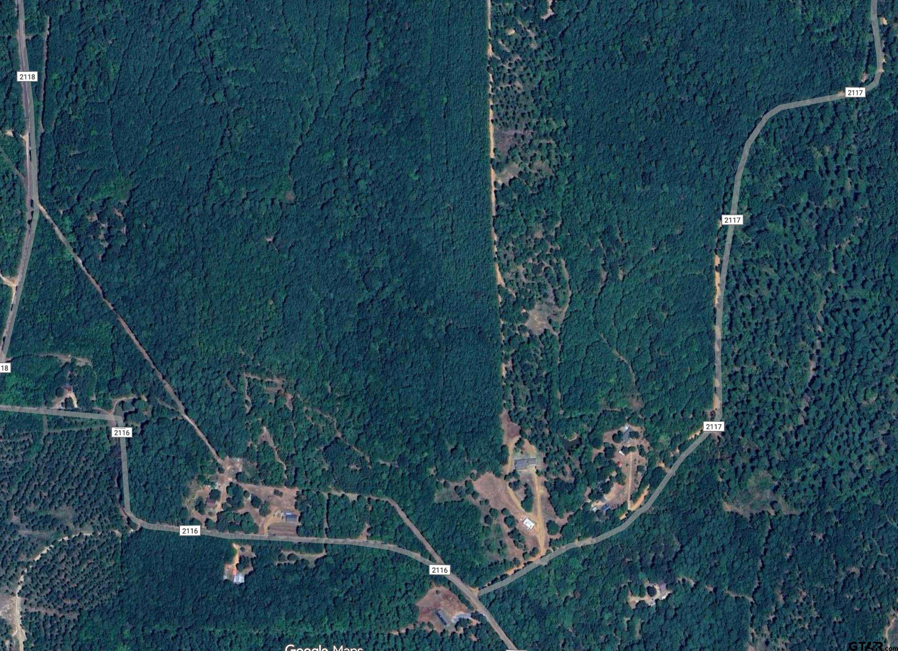 a view of a balcony with chairs