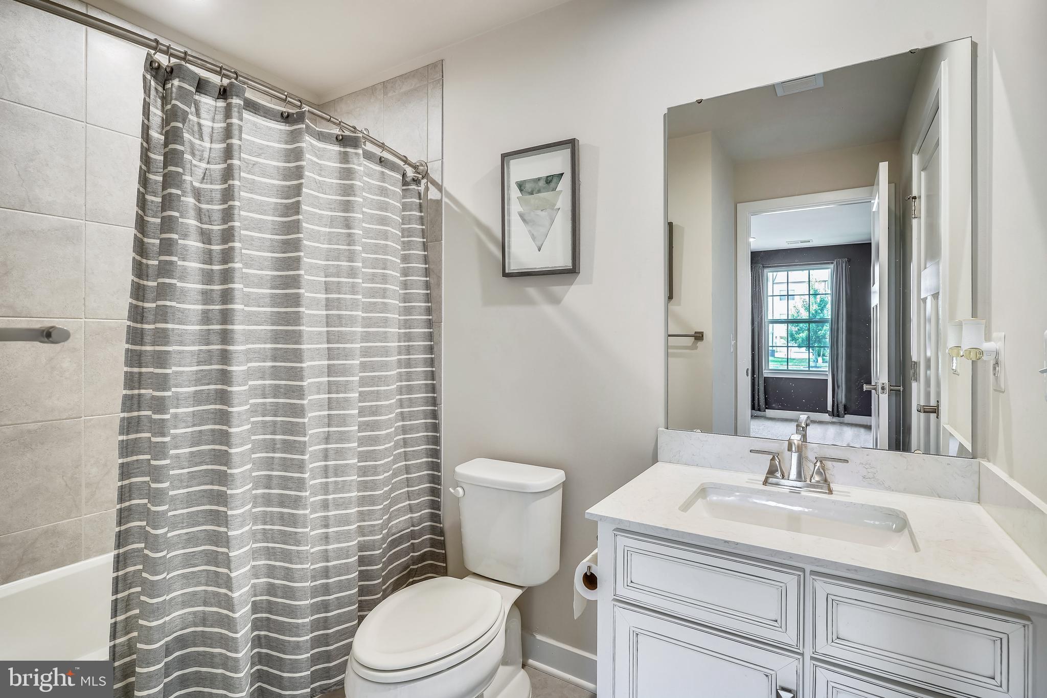 18101 Red Cedar Road Dumfries, VA 22026 - Photo 23 of 49 3RD FULL BATH W/DESIGNER TILE / DUAL ENTRY