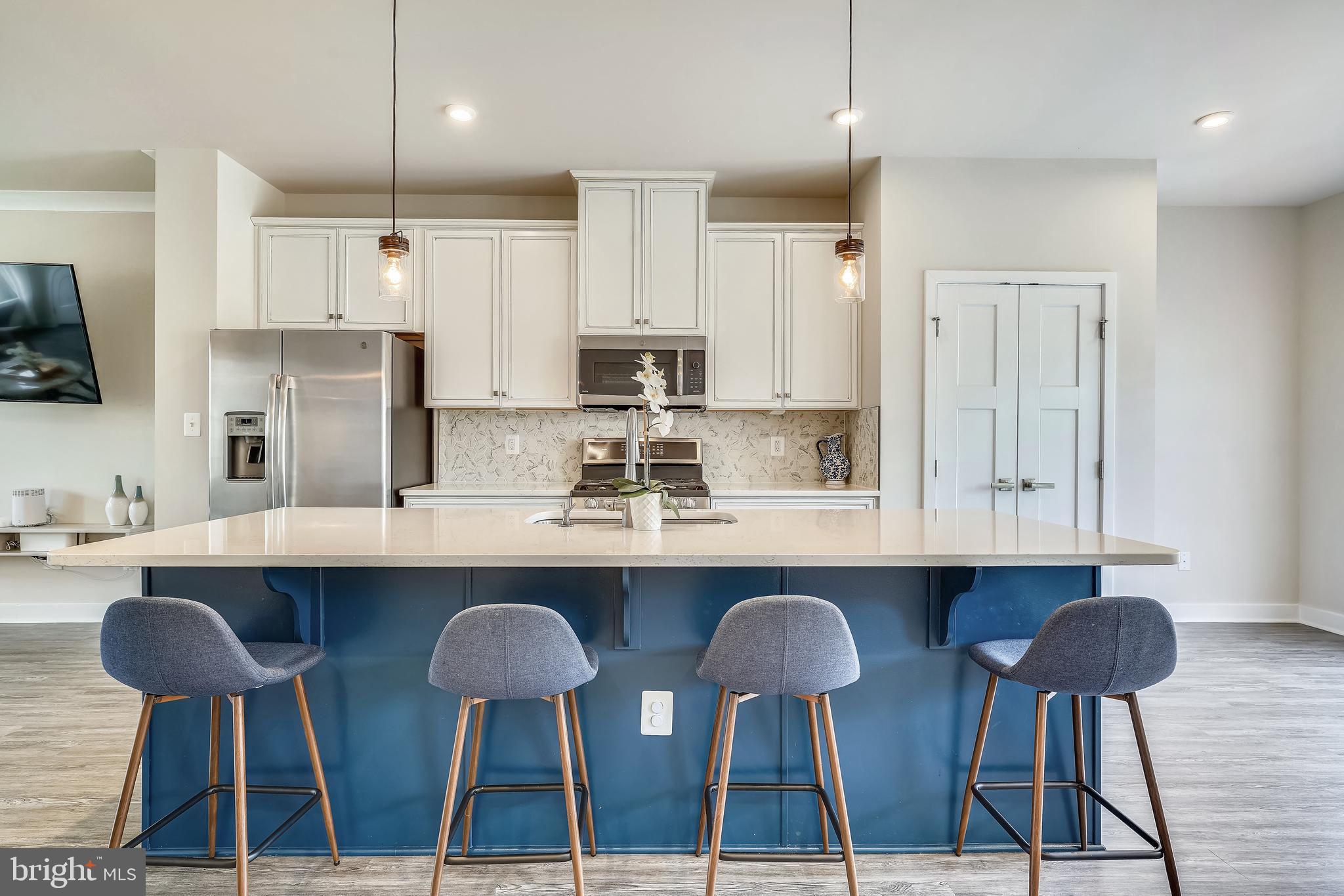 18101 Red Cedar Road Dumfries, VA 22026 - Photo 6 of 49 GOURMET KIT. FEAT 9' ISLAND W/OVERHANG W/QUARTZ