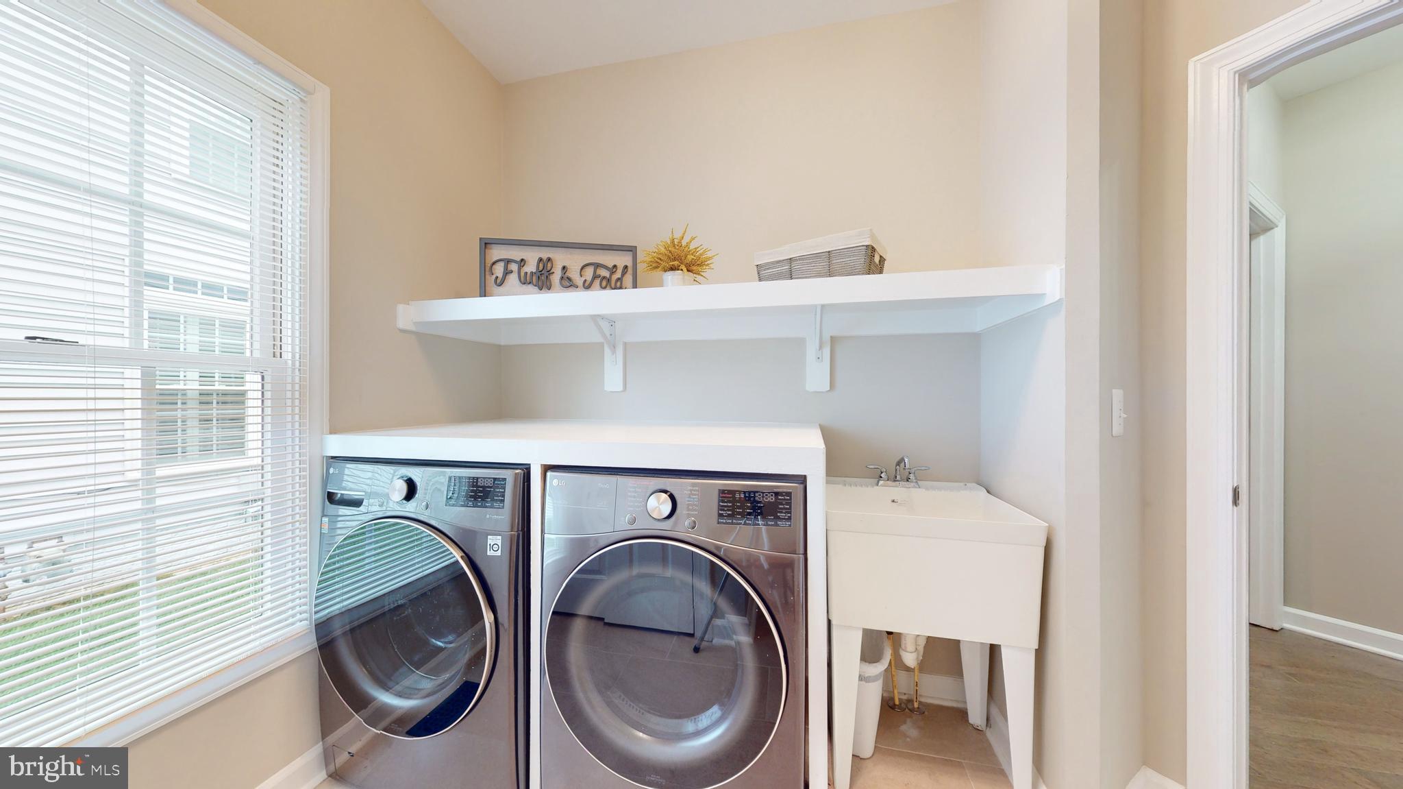 47321 Ox Bow Circle Sterling, VA 20165 - Photo 21 of 85 Main Level Laundry with Tub
